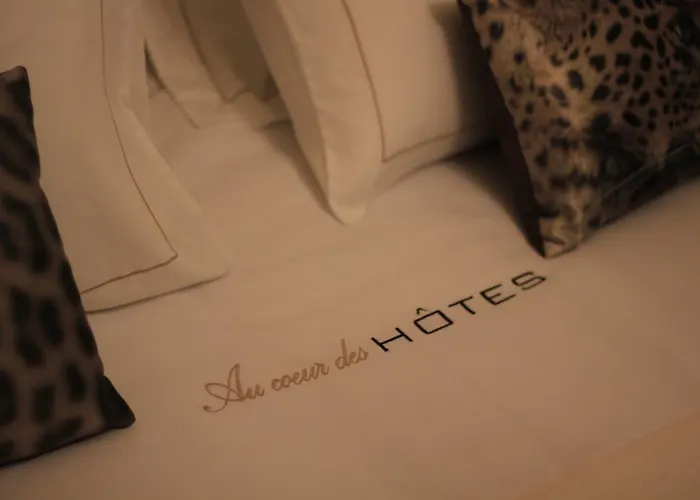 Au Coeur Des Hotes